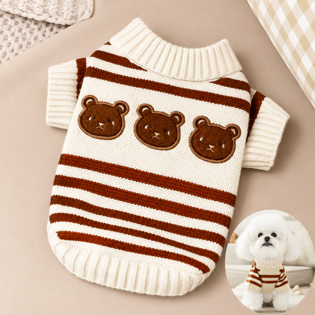 Cream knitted dog jumper with brown stripes and three bear faces laid flat